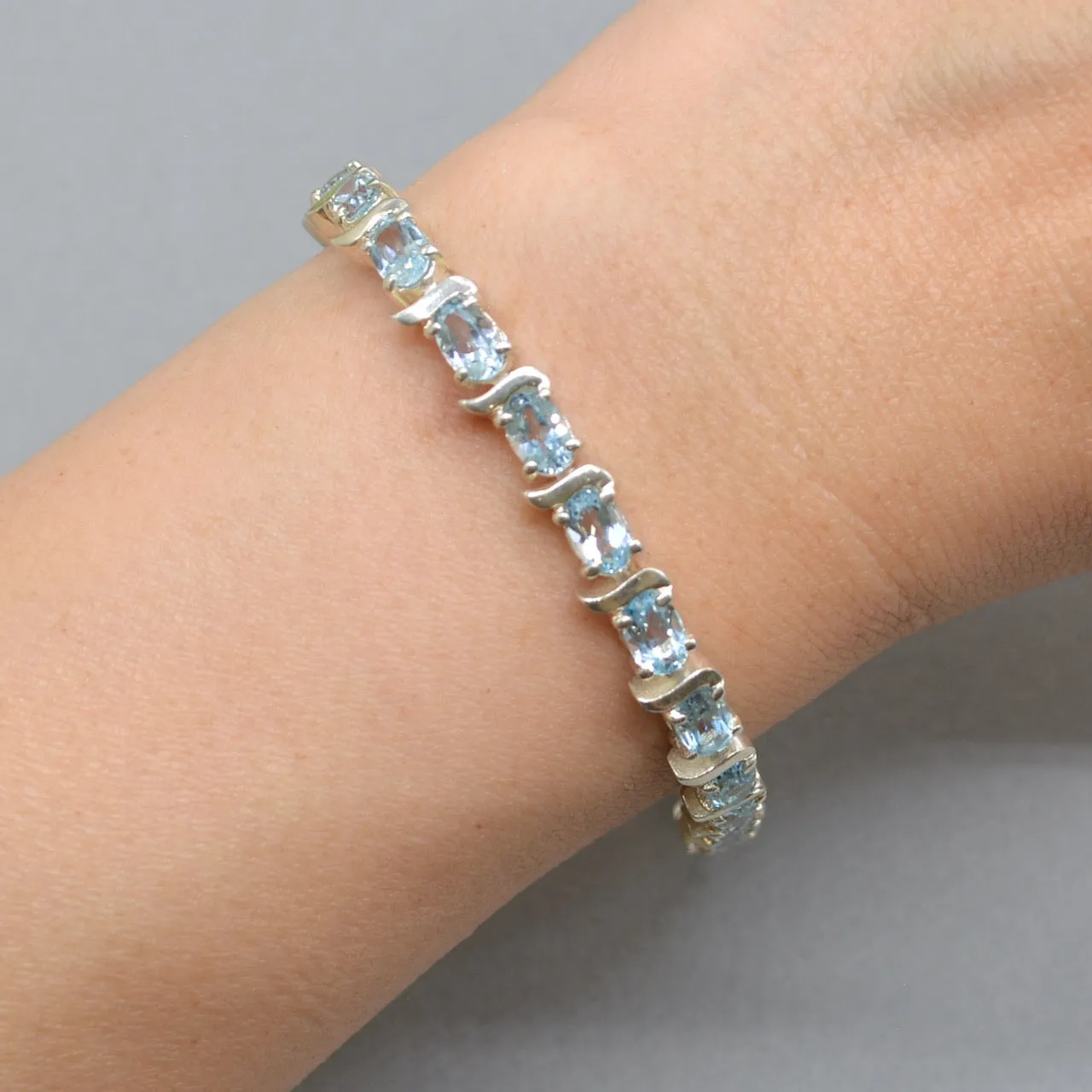 Sky Blue Topaz Tennis Bracelet in Sterling Silver UK Hallmarked (12 carats)
