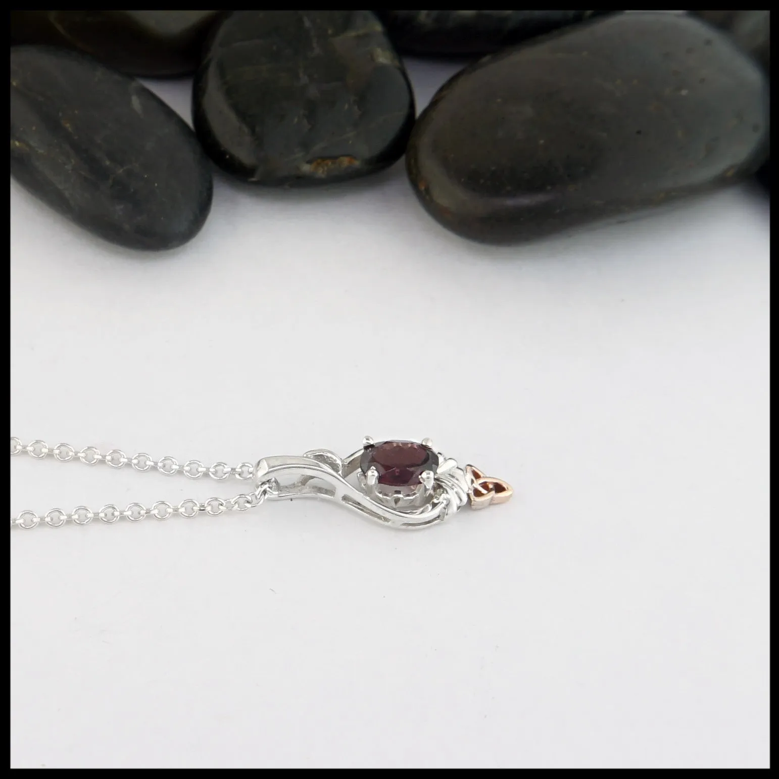 Trinity Twist Set with Rhodolite Garnet